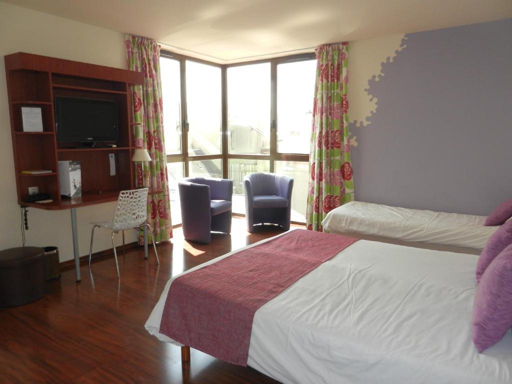 Logis L'Hôtel Chartres Kamer foto